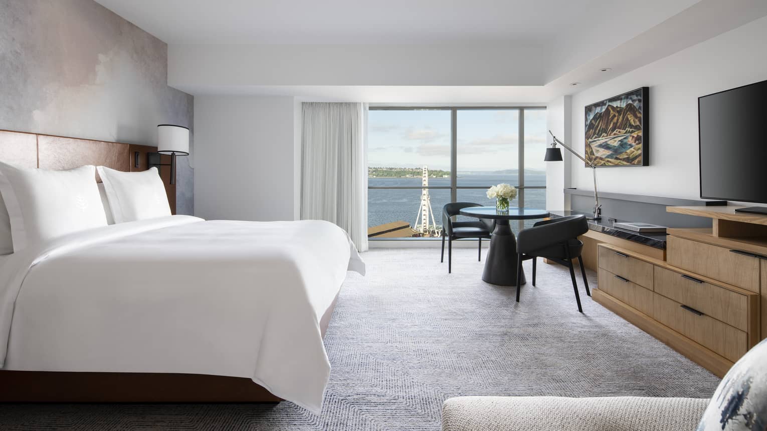 Deluxe Bay-View Rooms offer views of Elliott Bay through floor-to-ceiling windows