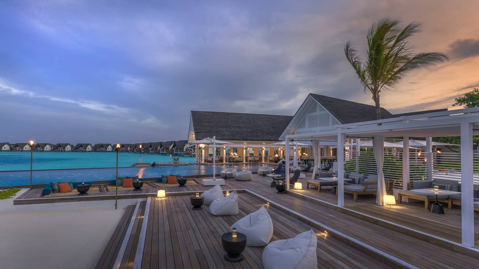 Beanbag chairs arranged outside the Blu Beach Club int he Maldives