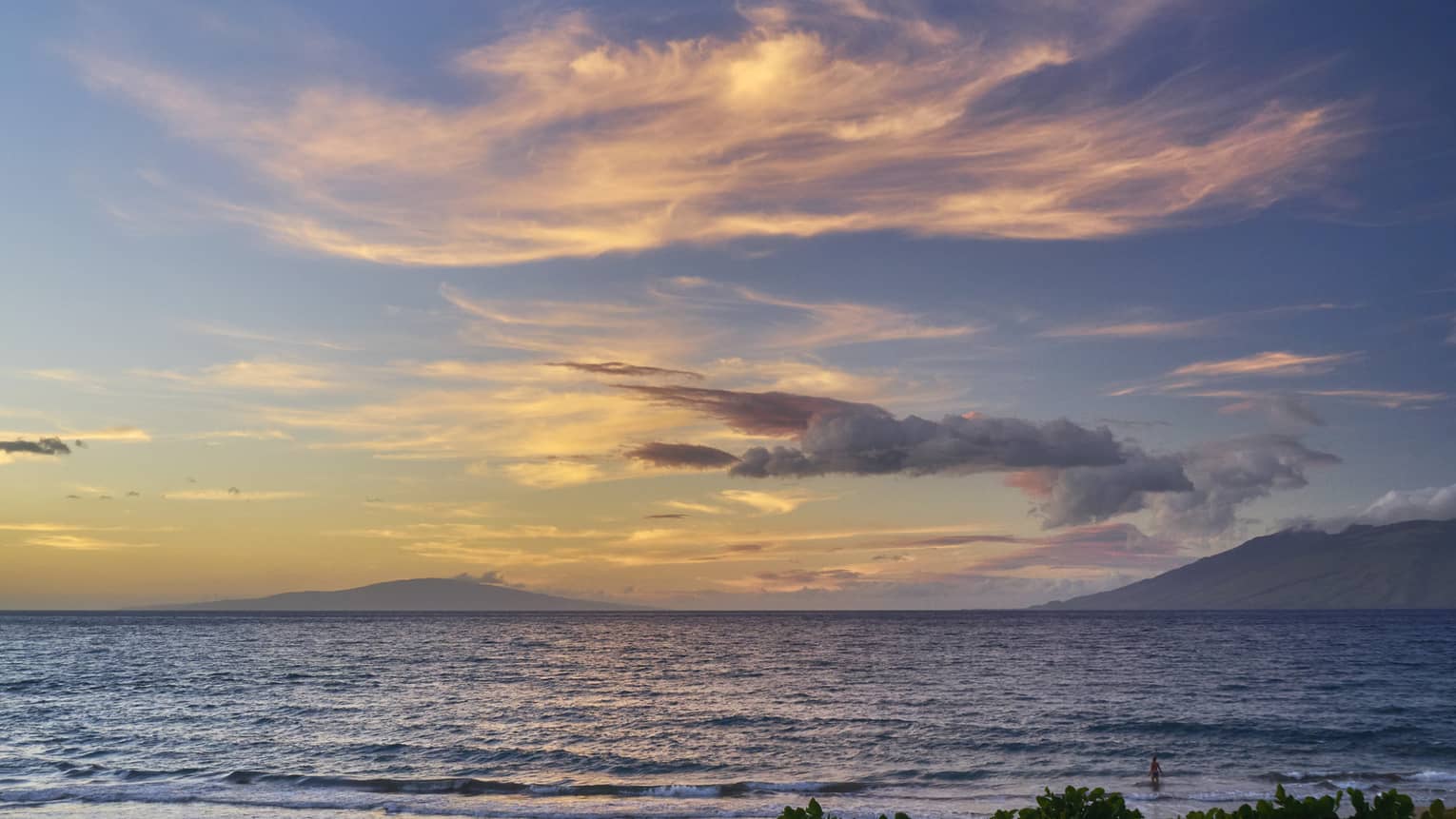 Sunset and clouds over Pacific ocean