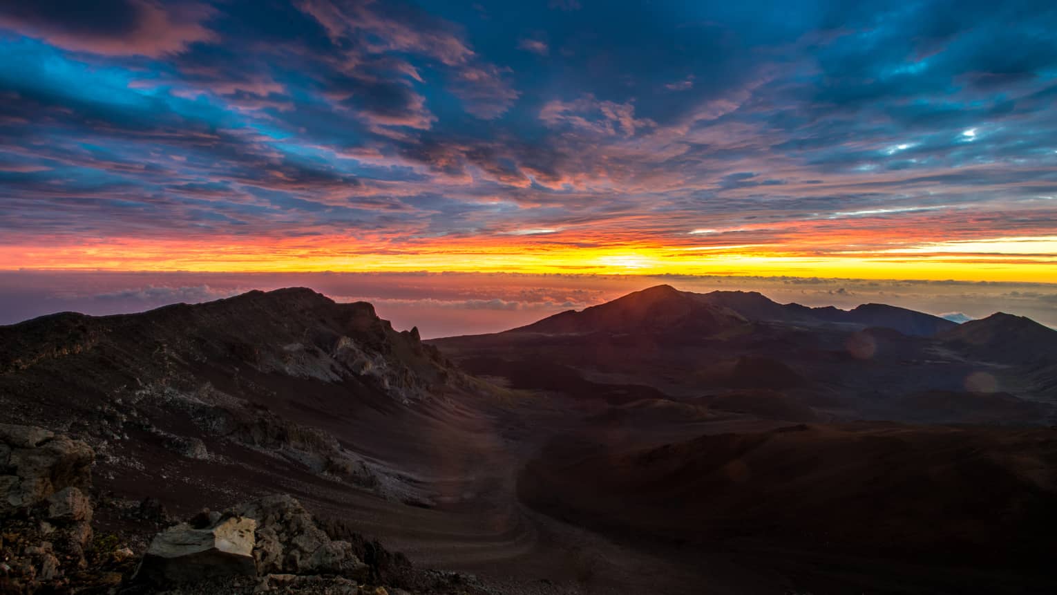 A sunrise over mountains.