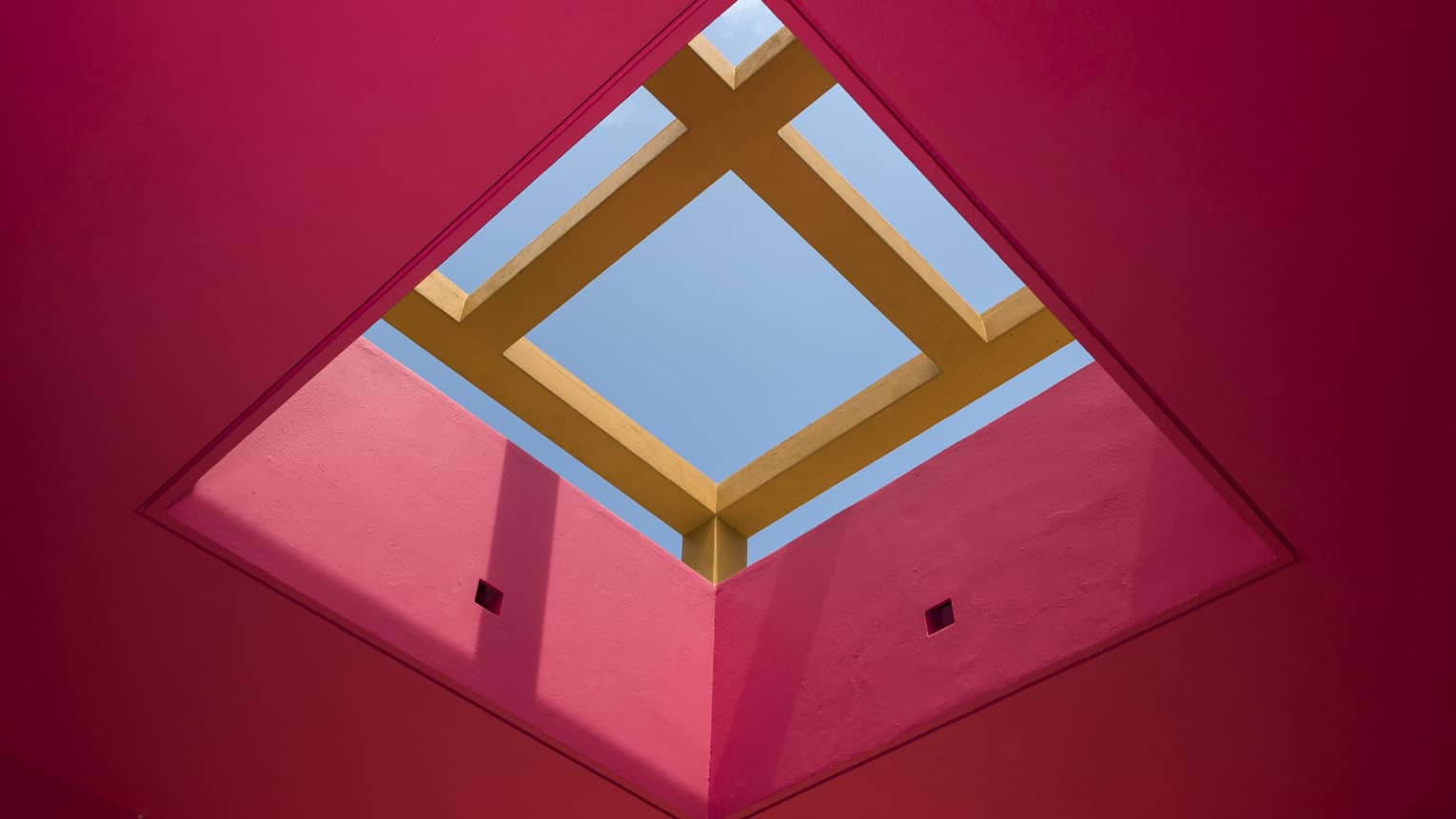 Pink ceiling with square window skylight