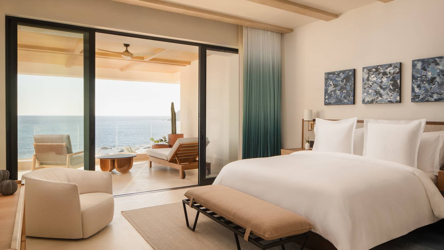 Bedroom with king bed and walk-out sea-view balcony