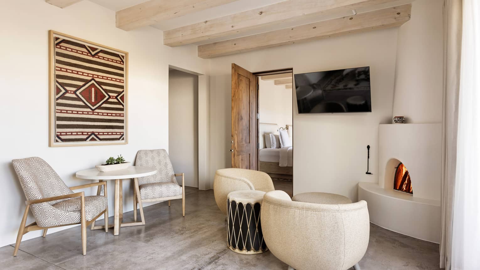 Sitting area with TV and connecting room at Four Seasons Resort Santa Fe