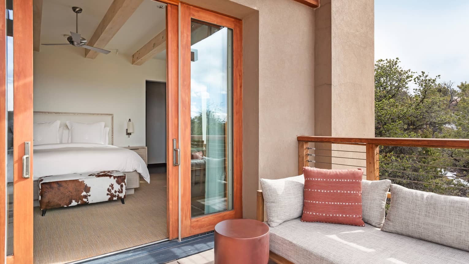 Guest room with furnished terrace at Four Seasons Resort Santa Fe