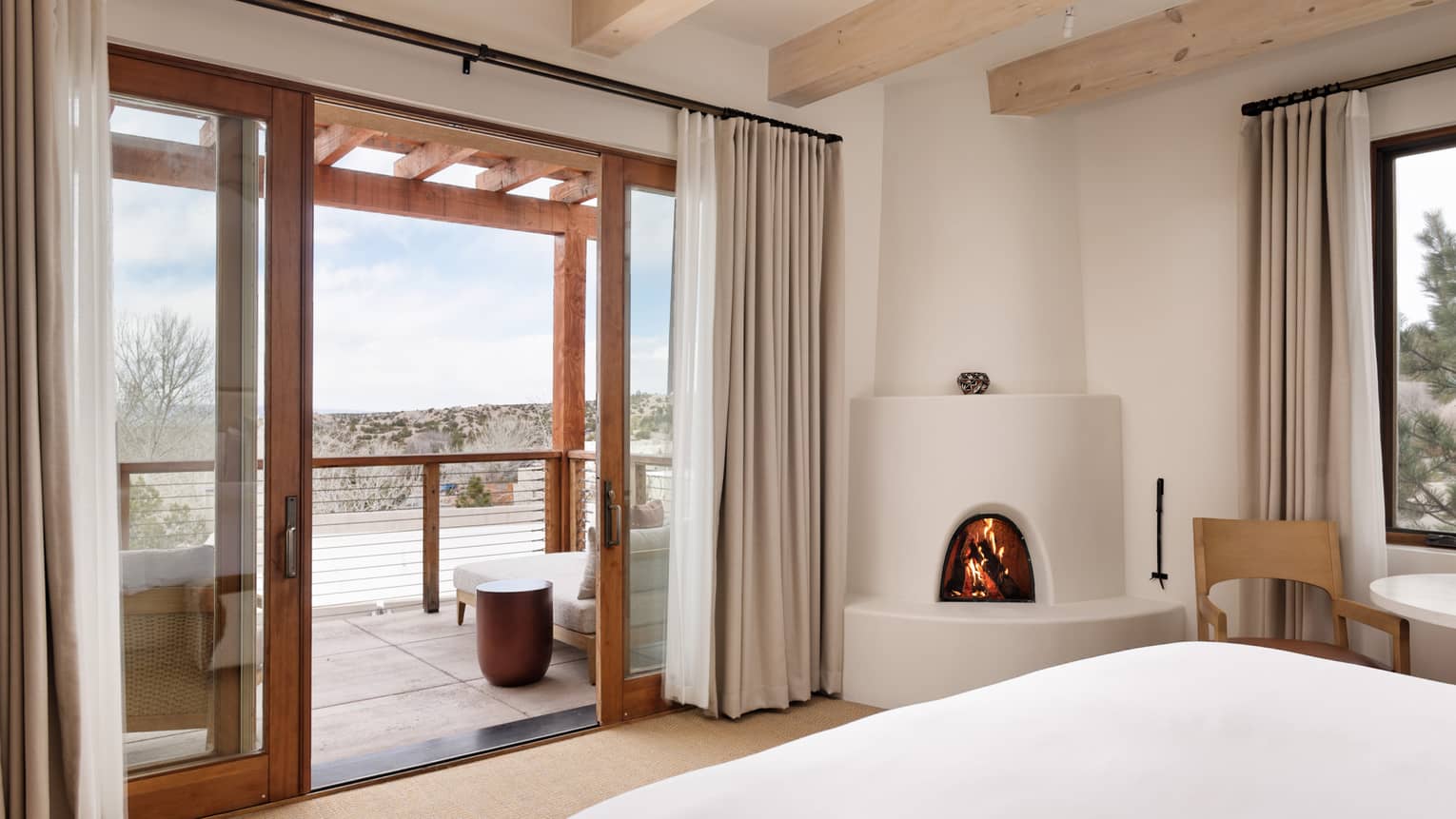 Guest room with private balcony at Four Seasons Resort Santa Fe