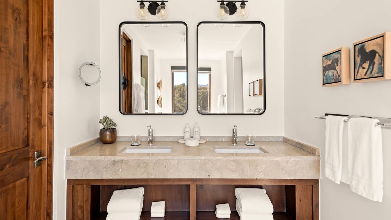 Guest room bathroom with double vanity at Four Seasons Resort Santa Fe