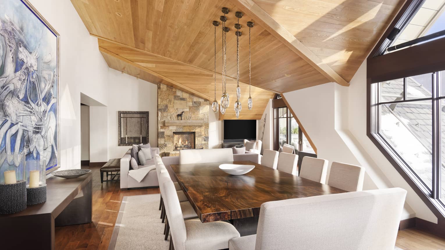Wooden dining table with 10 cushioned chairs