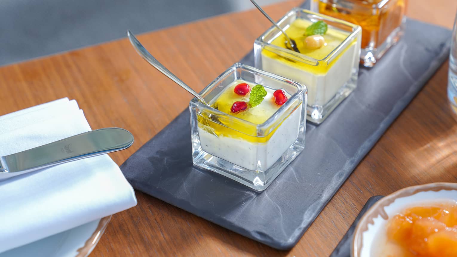 Cold dishes in small glass cups.
