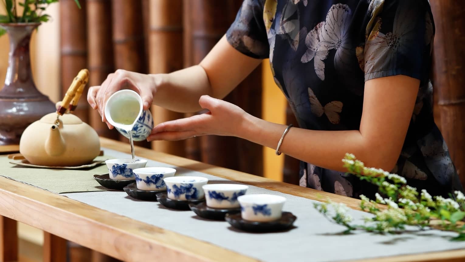 Tea Master Rita Feng pouring tea