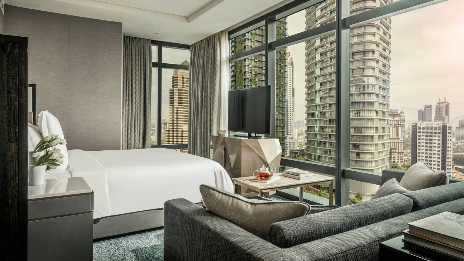 Corner Room with floor-to-ceiling windows and skyline views