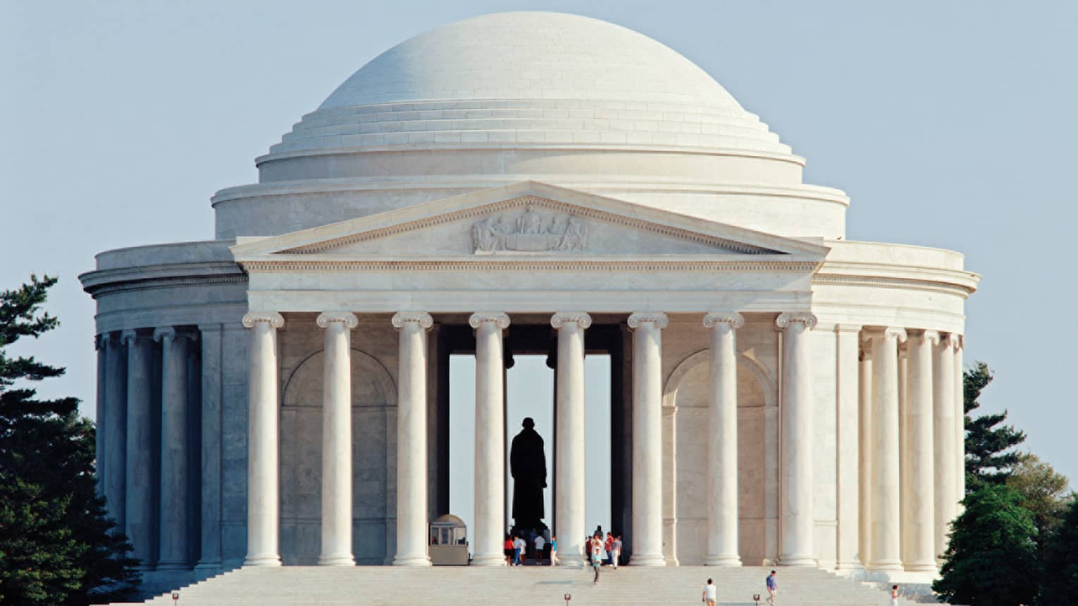Thomas Jefferson Memorial, people are walking along the stairs.