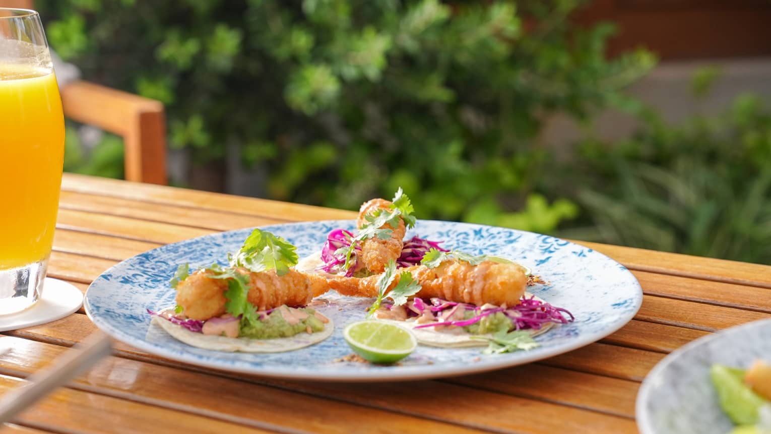 Prawn tacos on a plate.