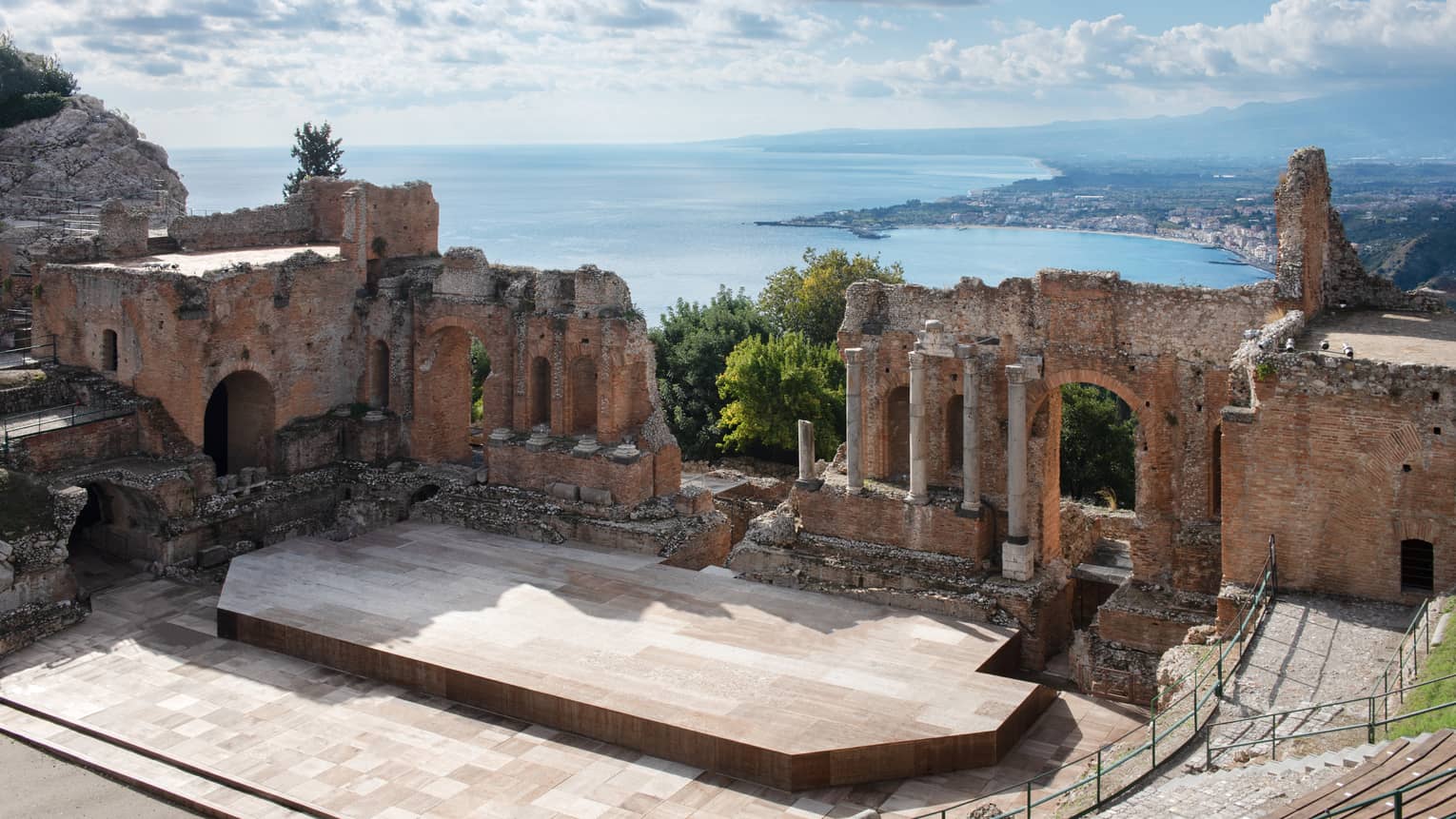Aerial view of ancient Greek theatre in Taormina, Sicily, sea in the distance
