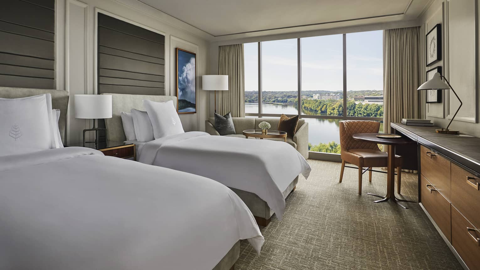 Lake View Room double beds, dresser, table, loveseat by window