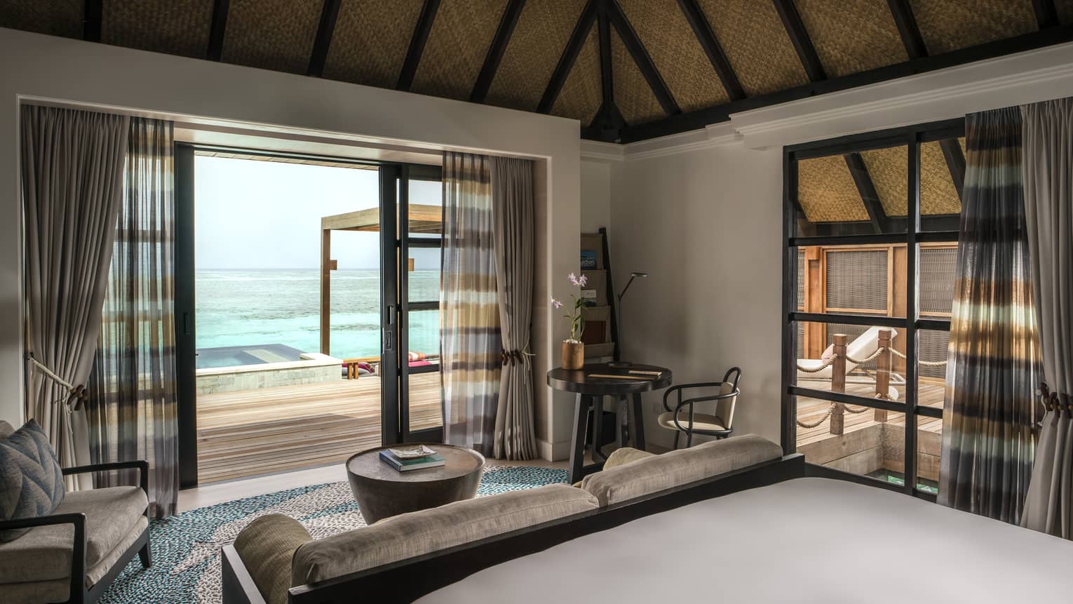 A calming sea view from inside a water suite