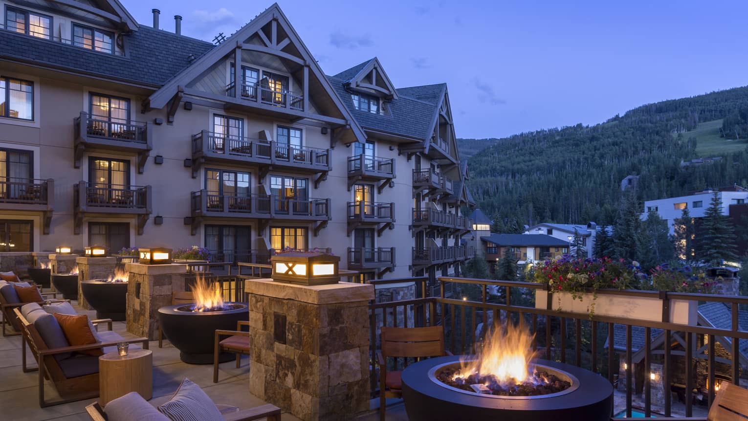 The Remedy Bar Terrace patio lounge, outdoor bonfire fireplace at night