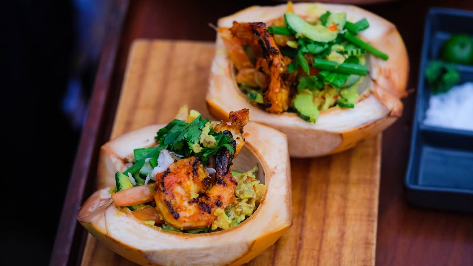 Shrimp dish in a bowl made of a coconut