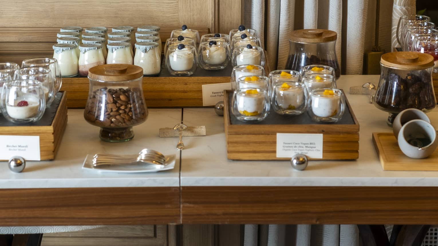A display counter holds various attractive displays of small food items.
