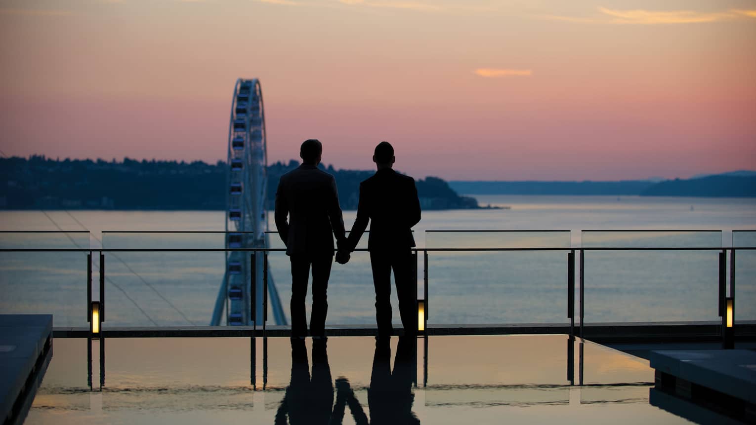 This image depicting two people holding hands and relates to ESG at Four Seasons and advancing diversity, inclusion and belonging at Four Seasons.