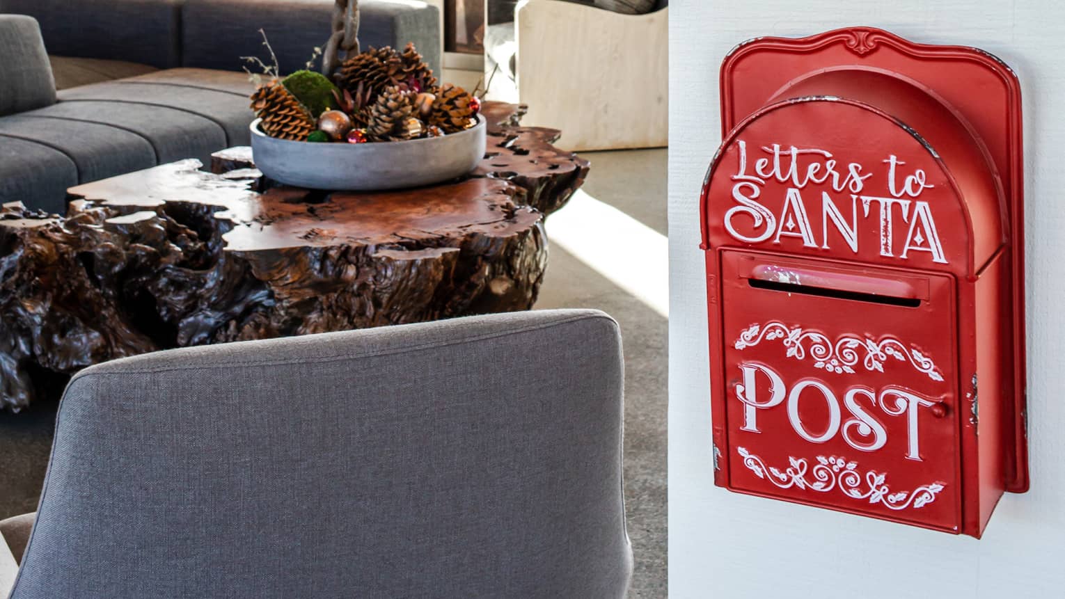 Living room with gray couches and chairs and a red "Letters to Santa" mail box.
