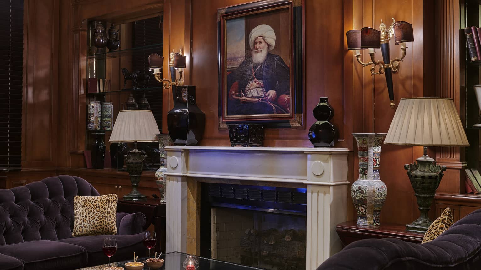 Sitting area with fireplace at Le Bar