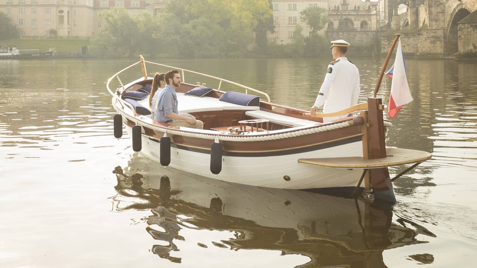 Couple enjoying river boat trip in Prague
