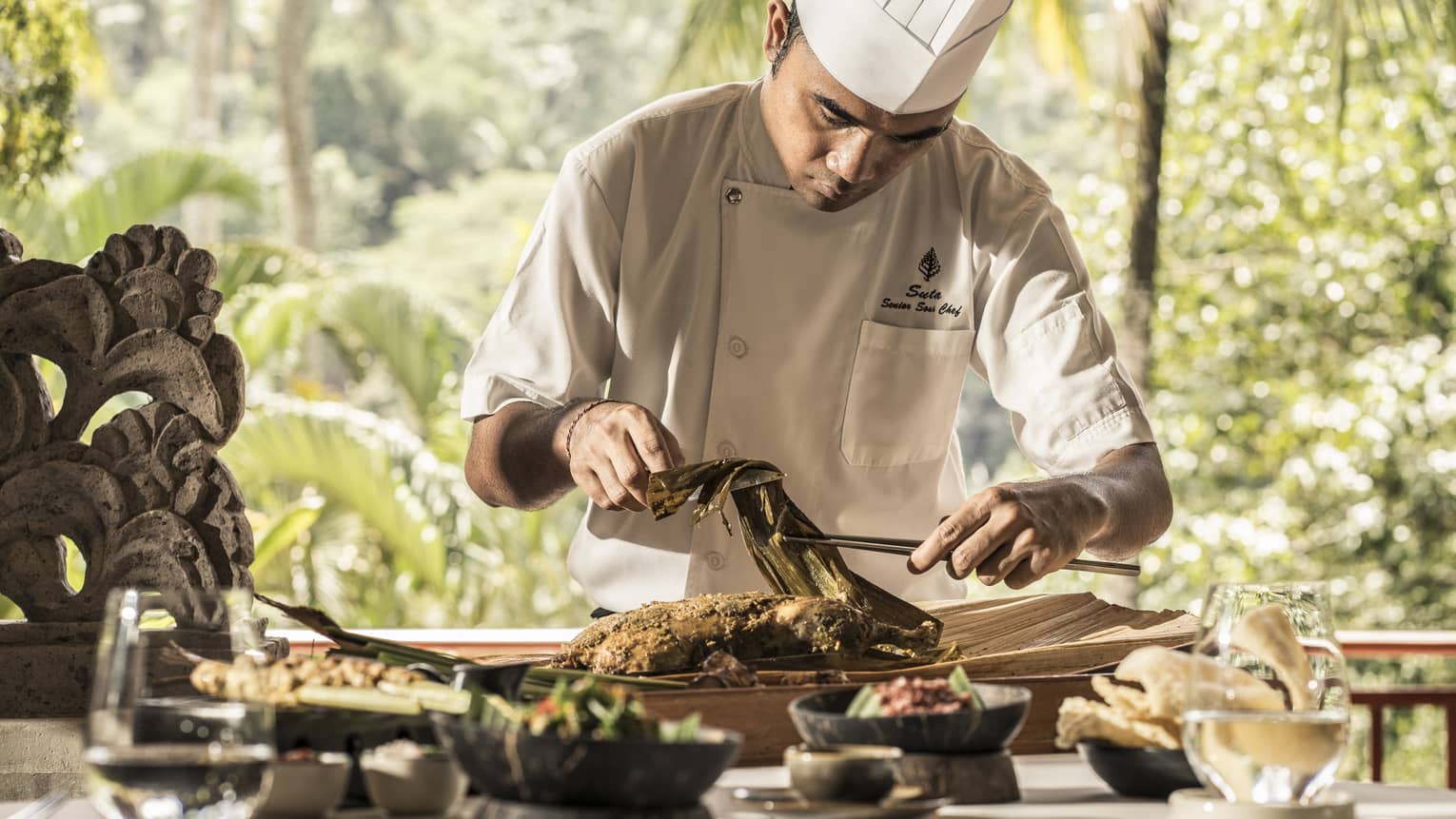 Chef Suta, carefully preparing a meal