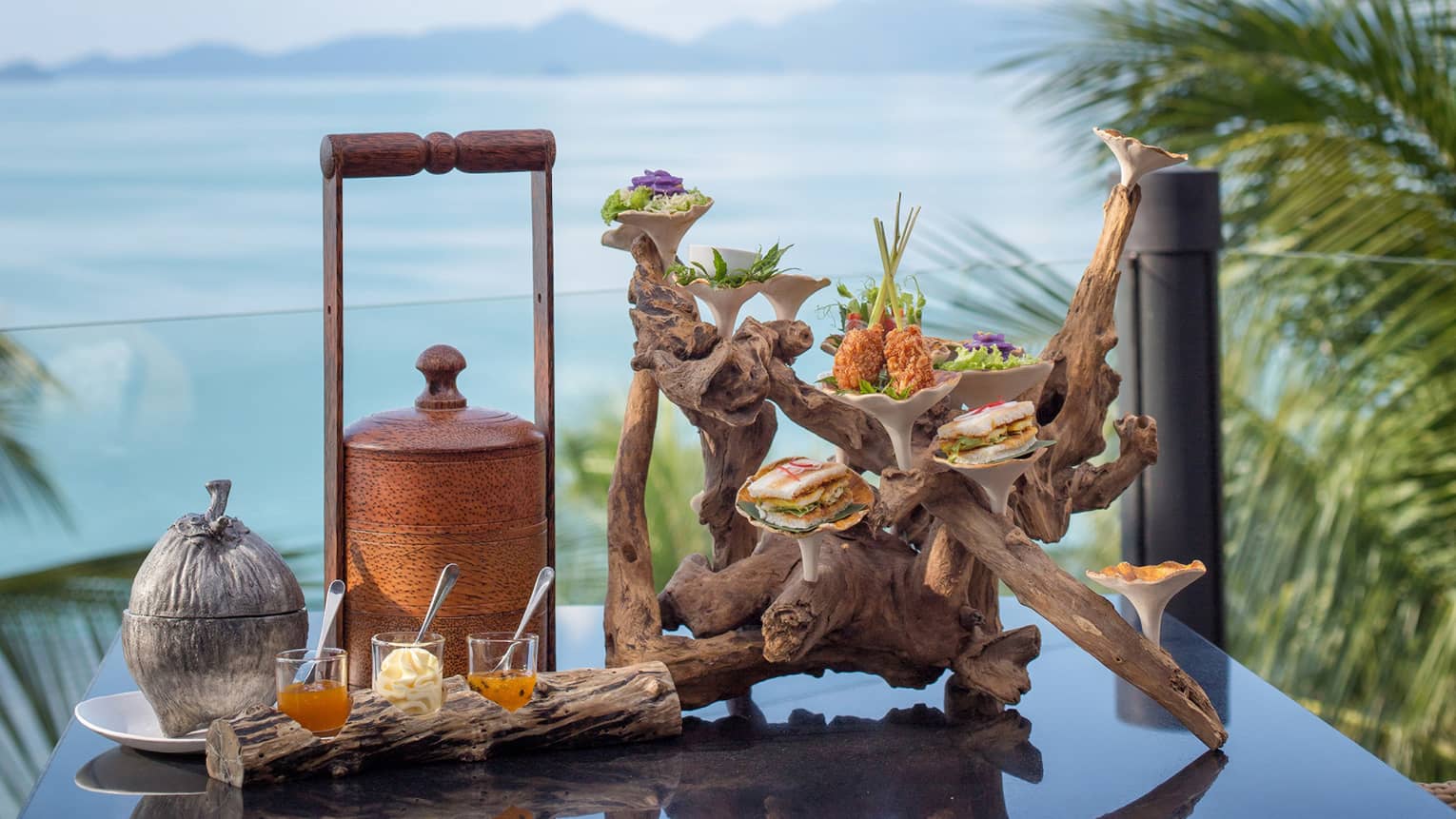 Afternoon tea on a terrace in Koh Samui with a view of the Gulf of Thailand