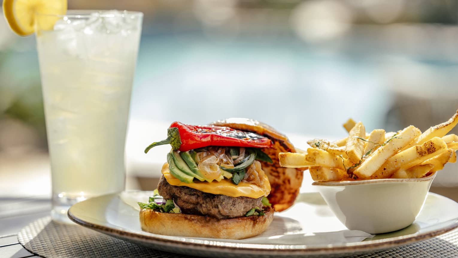 Cheeseburger, fries, glass of lemonade