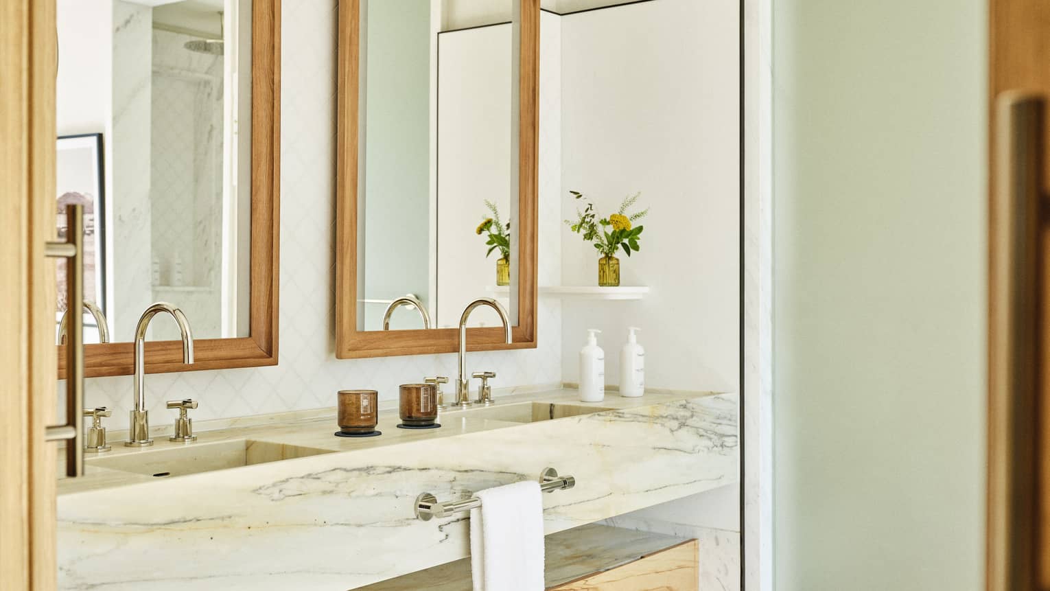 Bathroom with marble double vanity at luxury resort