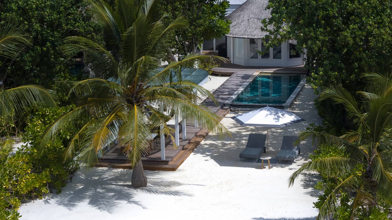 Aerial view of sunrise family beach villa 