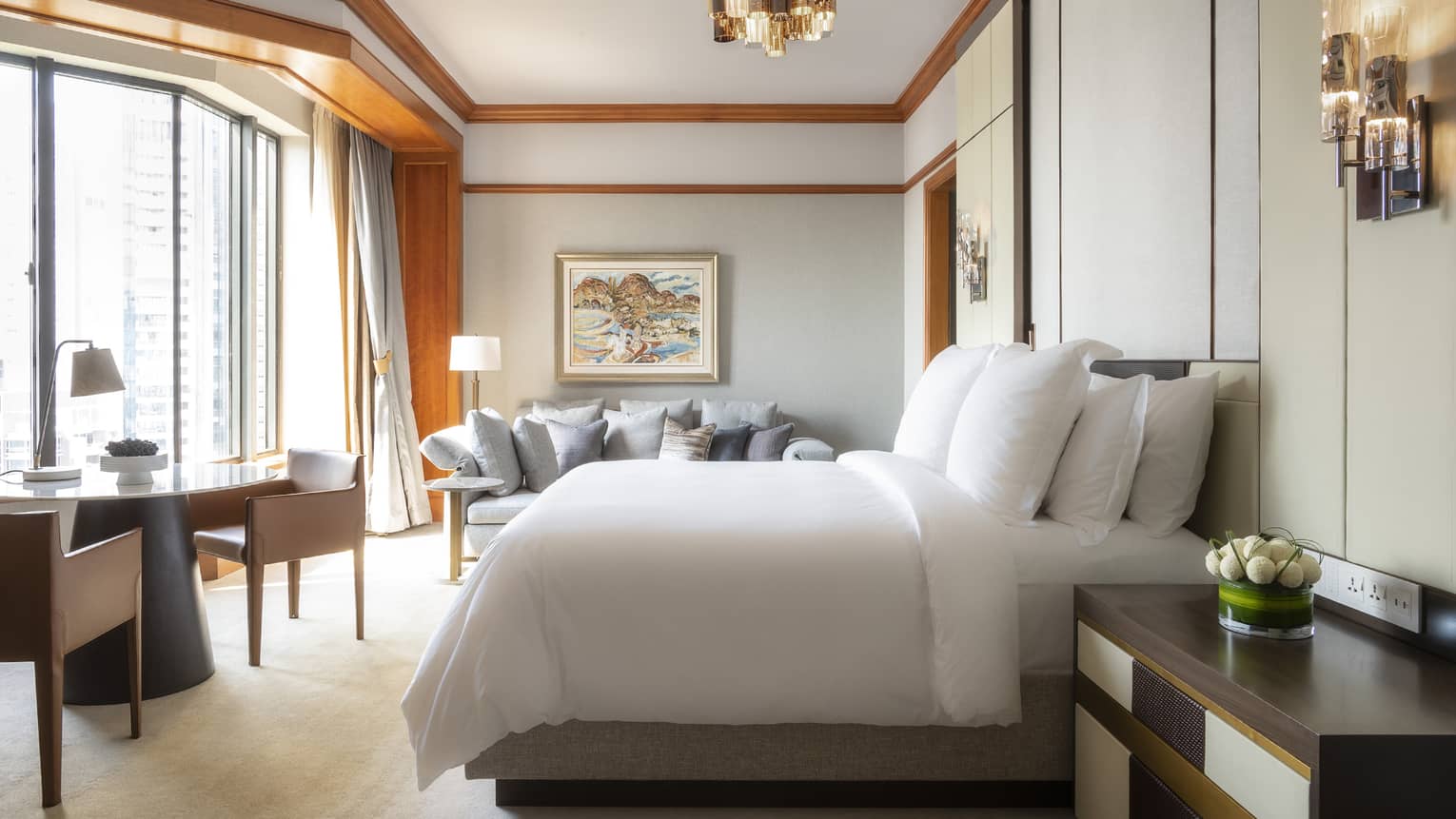 Governor Suite Bedroom with small dining area and floor-to-ceiling windows
