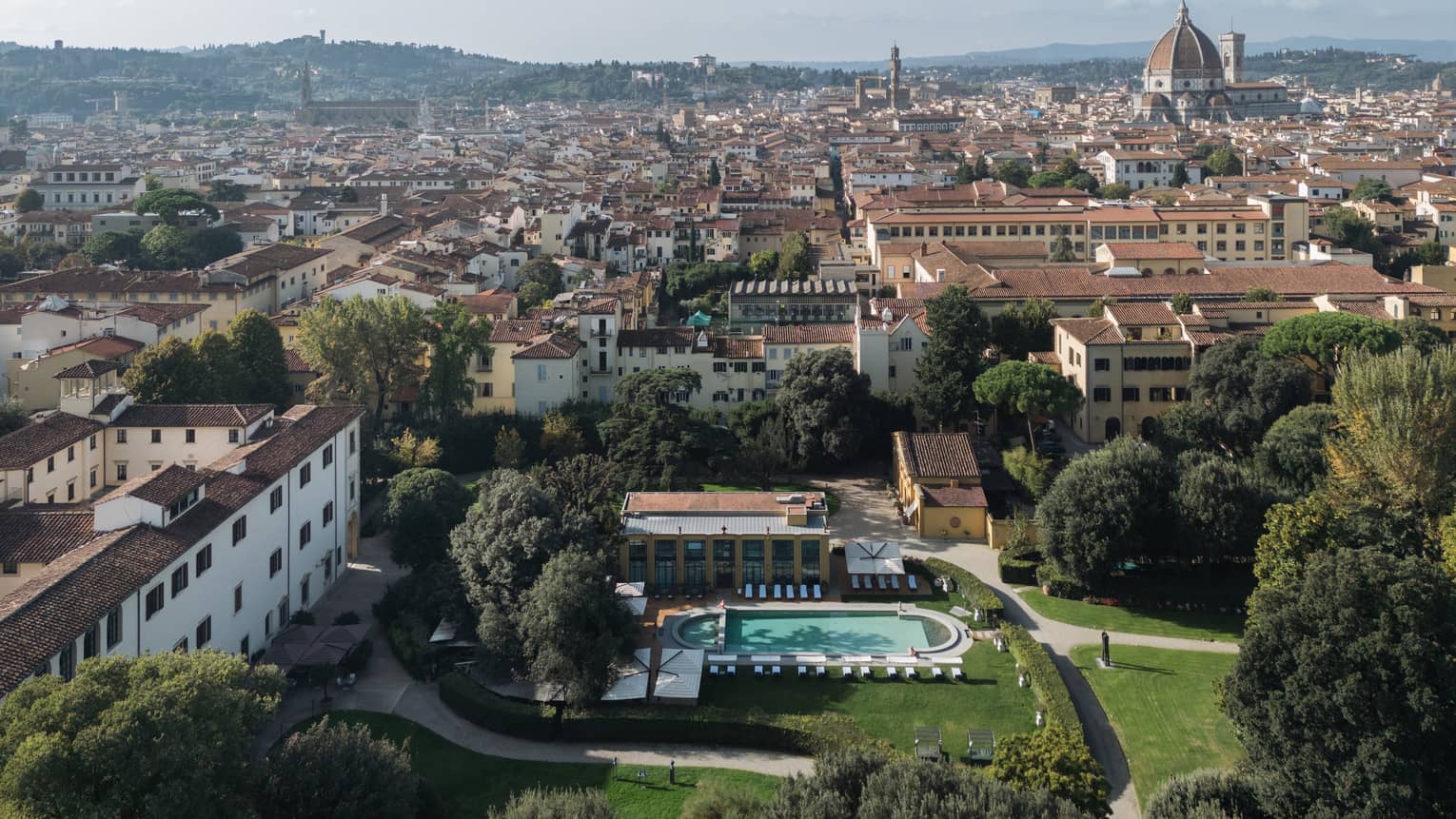 Aerial view of the property and surrounding area