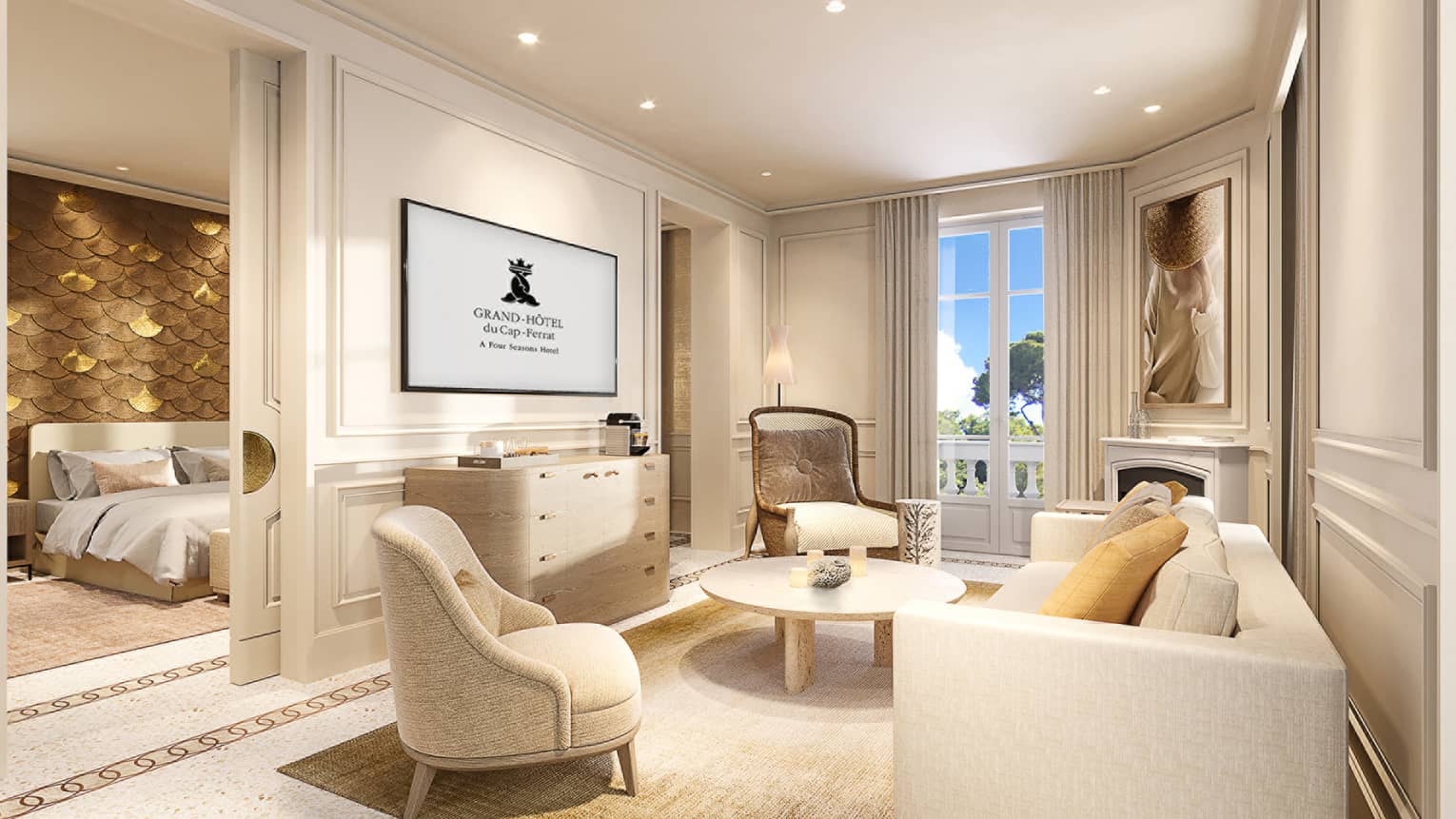 Living room with white sofa and two arm chairs, TV, entrance into bedroom