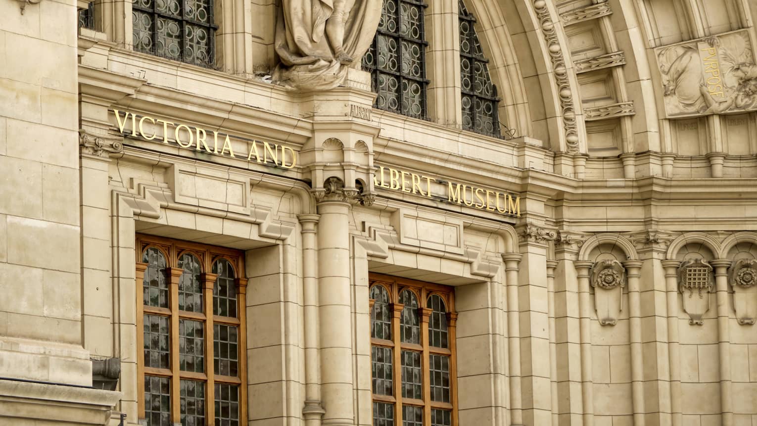 Elaborate stone arch of Victoria and Albert Museum exterior