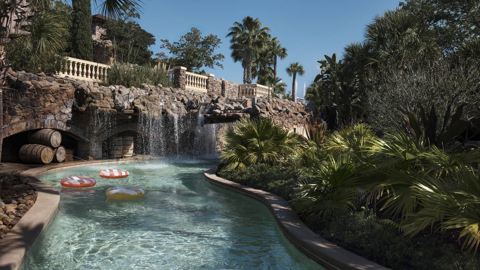 Lazy river with waterfall feature at Four Seasons Resort Orlando