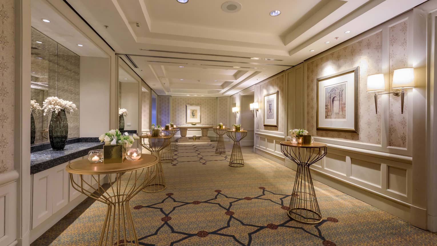 Elegant meeting room foyer with wall sconces