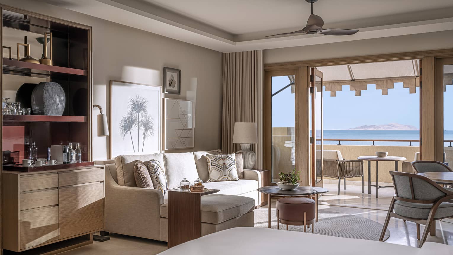 Premier Sea View Room living area opening onto balcony with views of the Red Sea