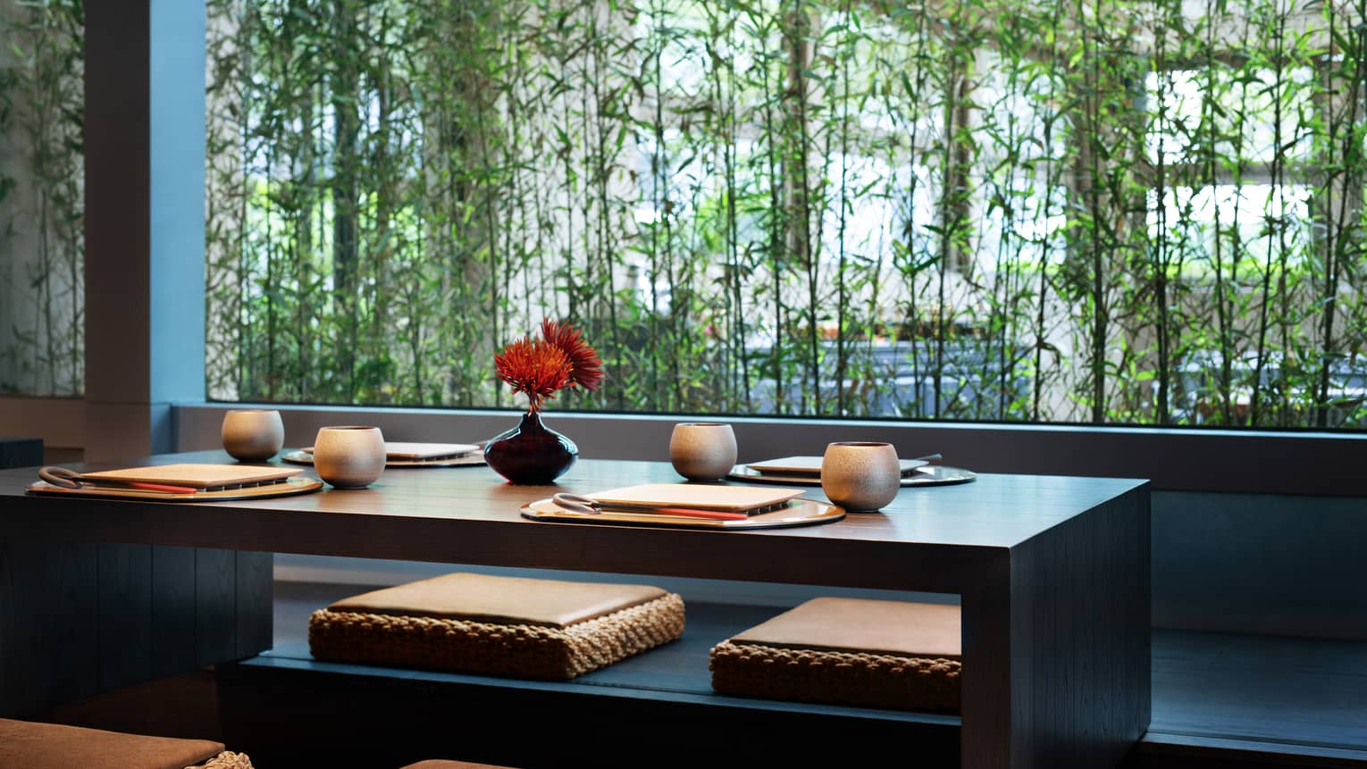 Matsuyi Tatami table flanked by vines of bamboo