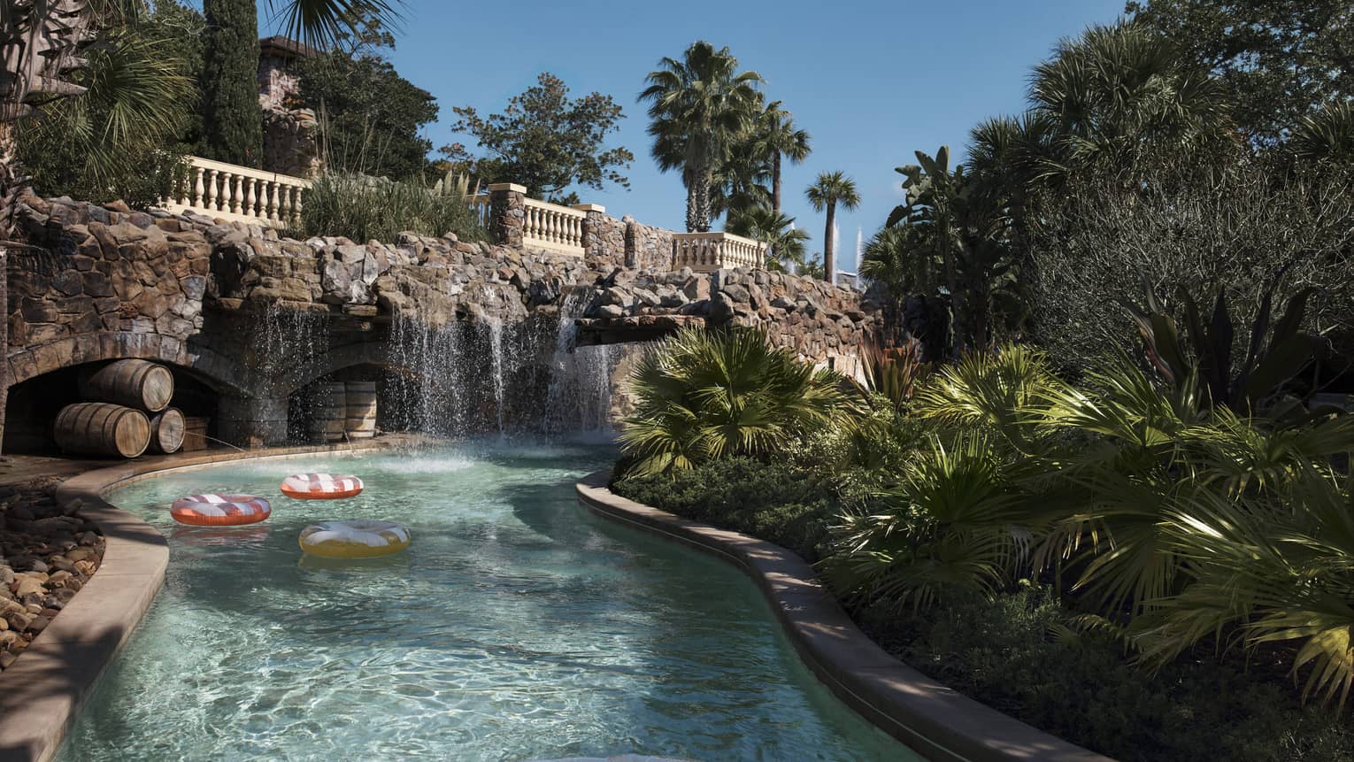 Lazy river with waterfall feature at Four Seasons Resort Orlando