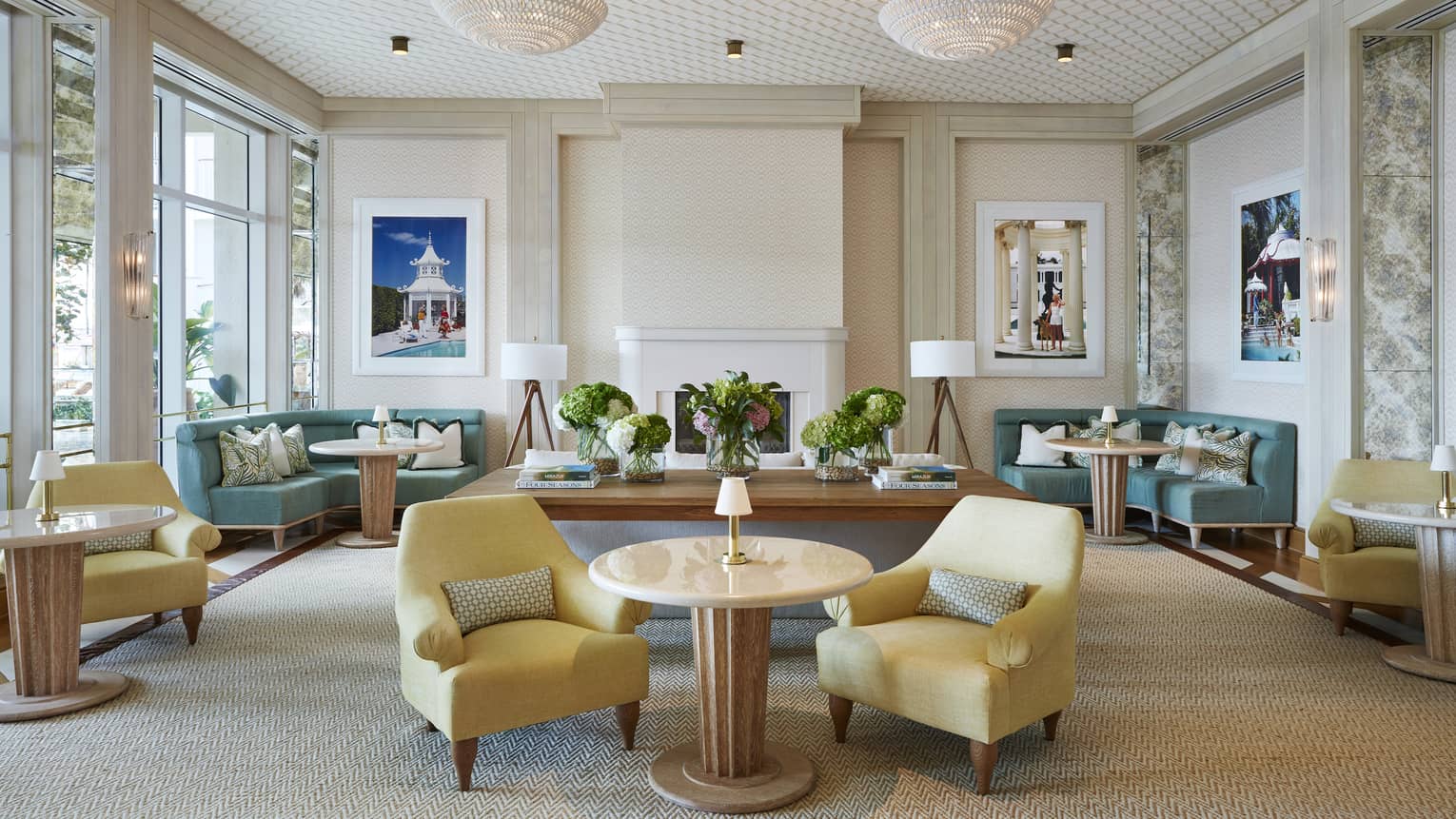 Comfortable chairs and couches surround a lounge room 