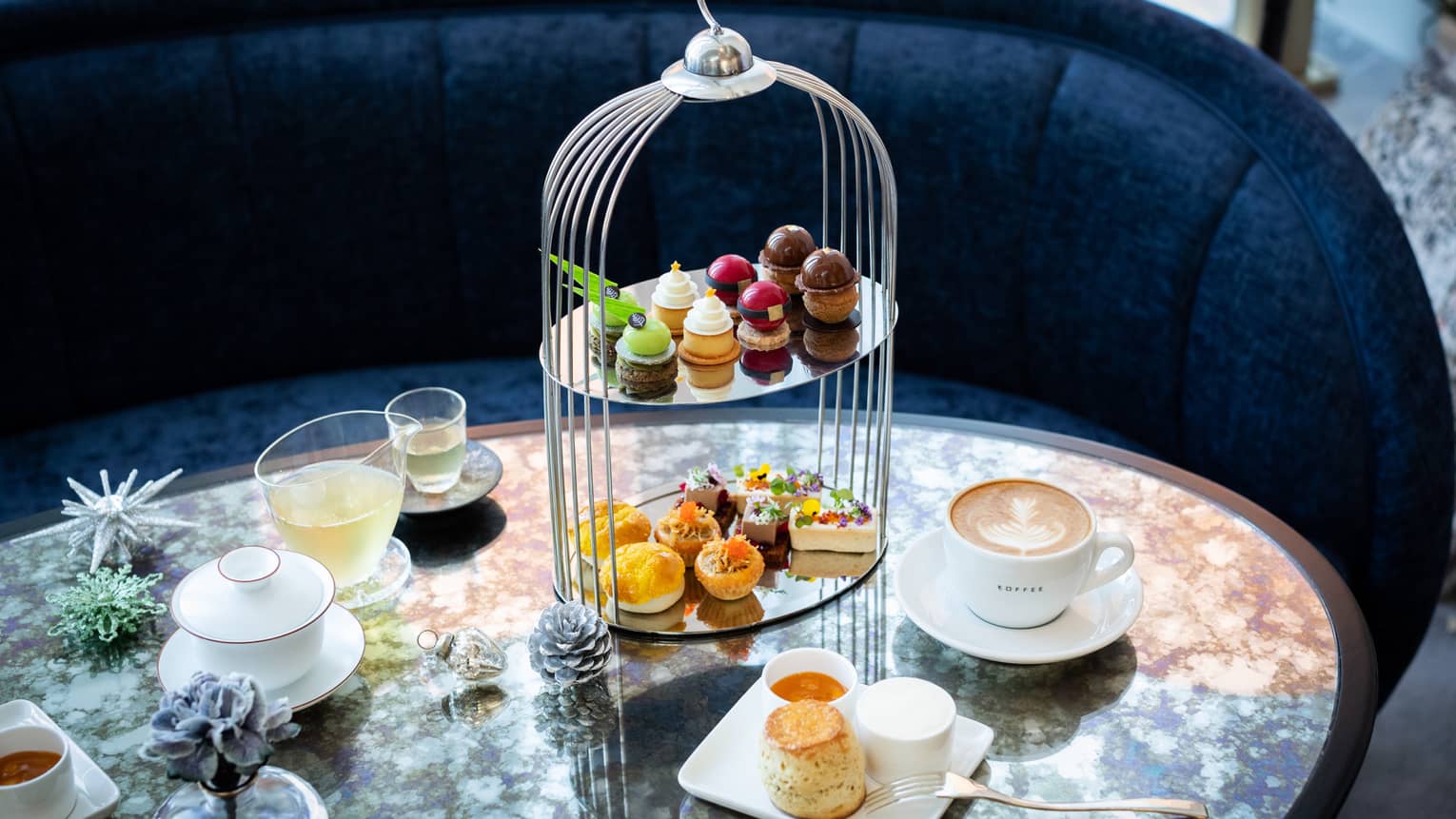 Holiday Afternoon Tea tower with sweets, coffee and tea
