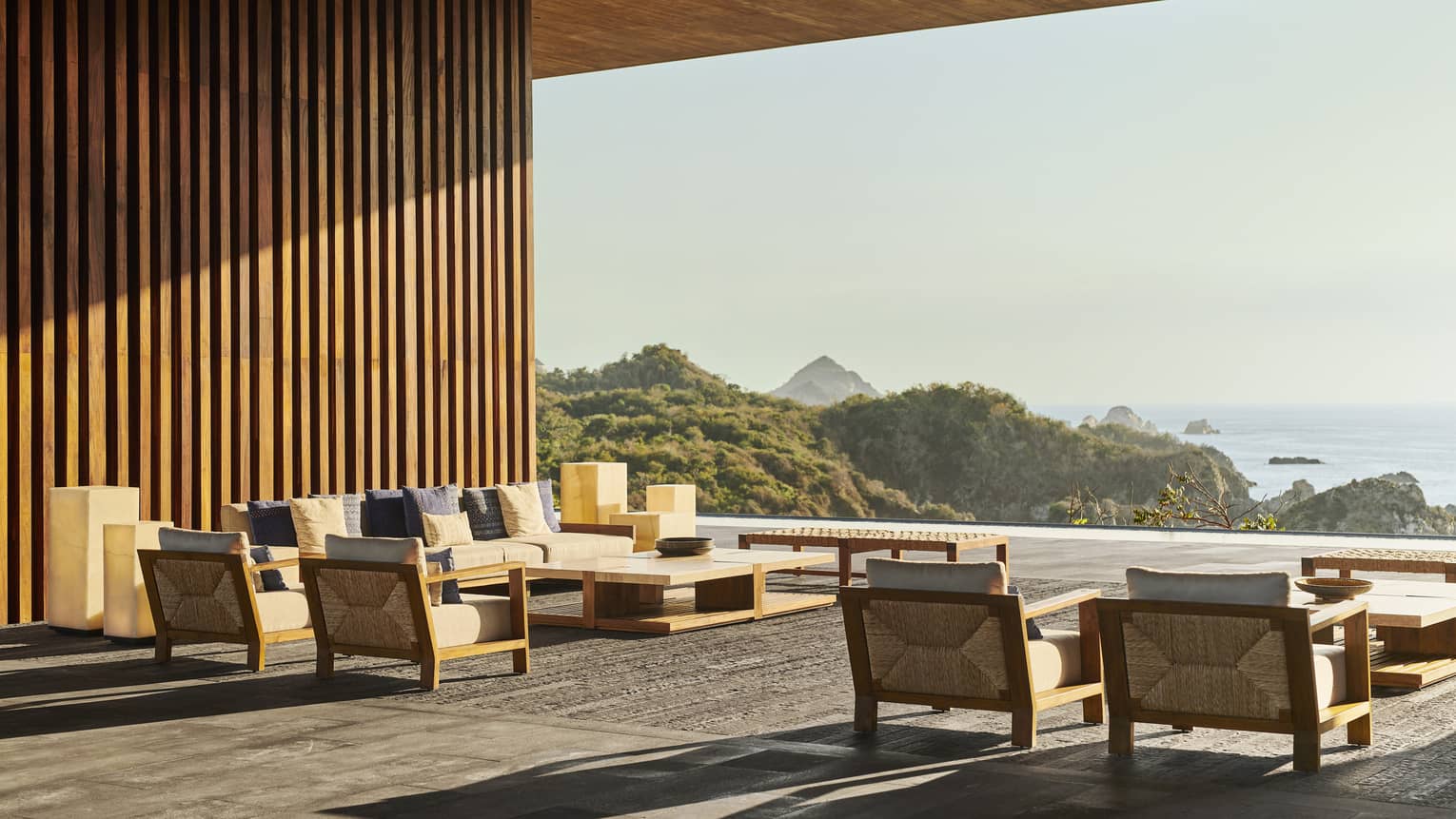A large open seating area looking out at the ocean.
