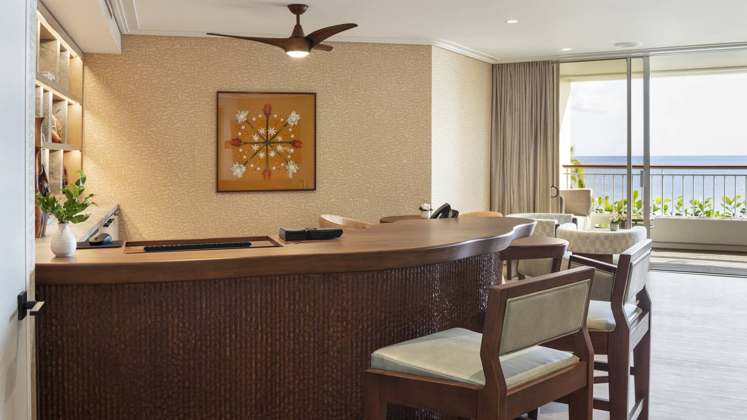 Front desk with four counter-height chairs at resort club lounge