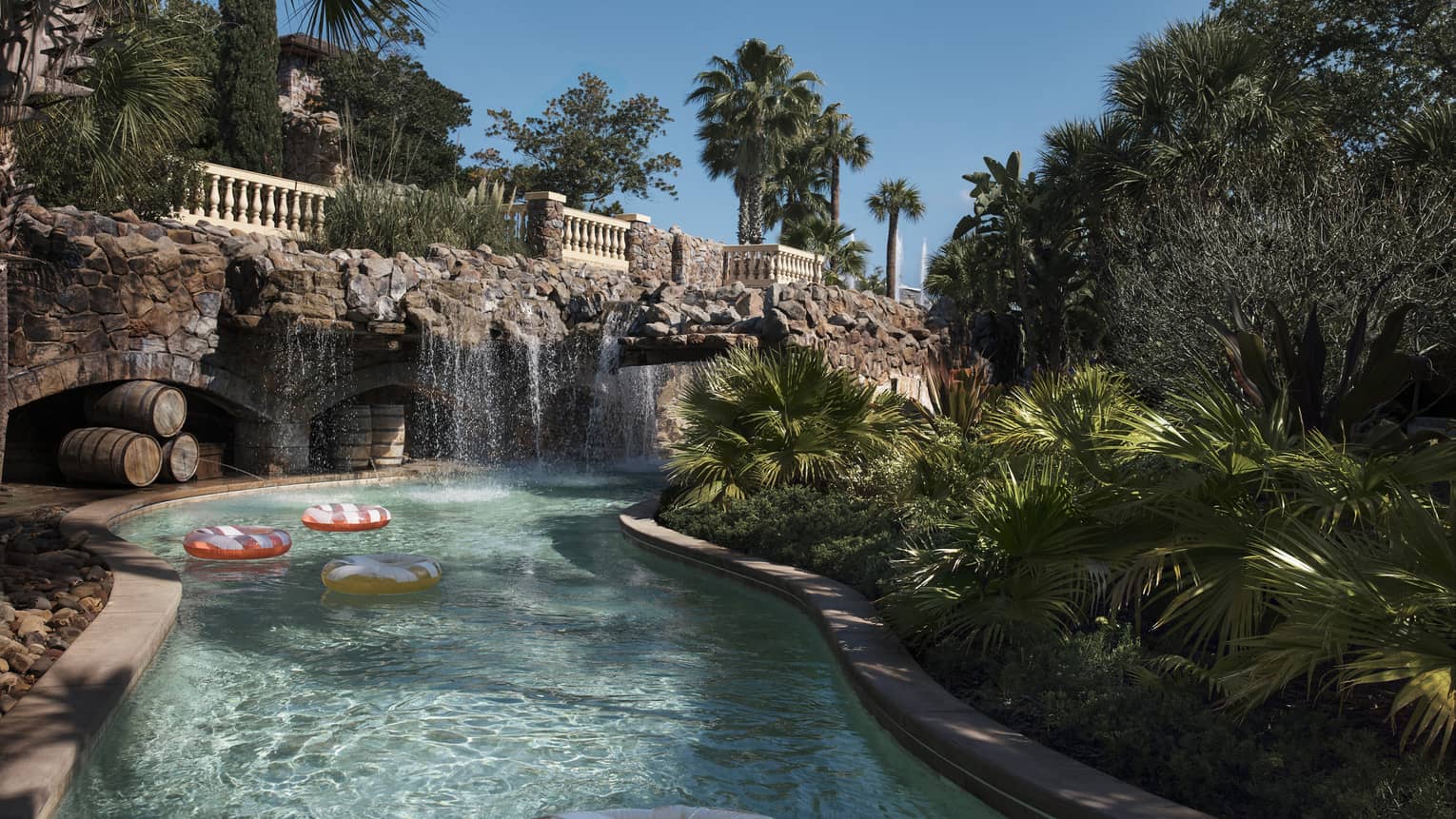 Lazy river with waterfall feature at Four Seasons Resort Orlando