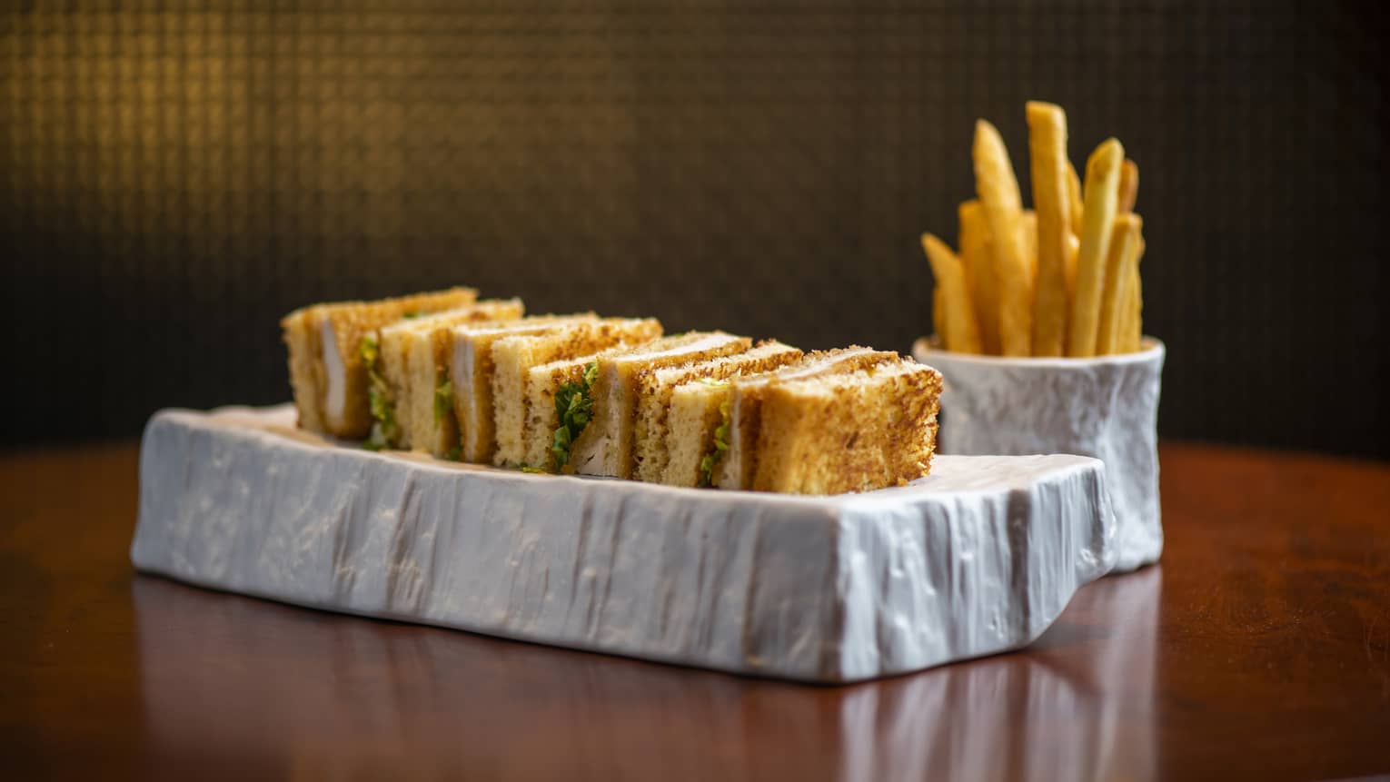 Club sandwich with fries
