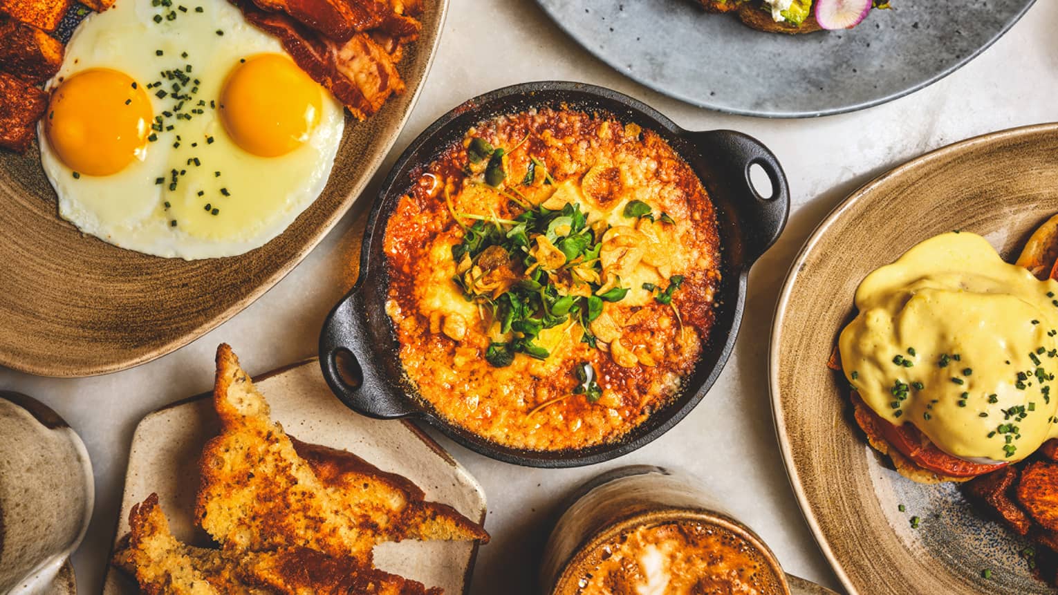 A variety of brunch dishes arranged on a table