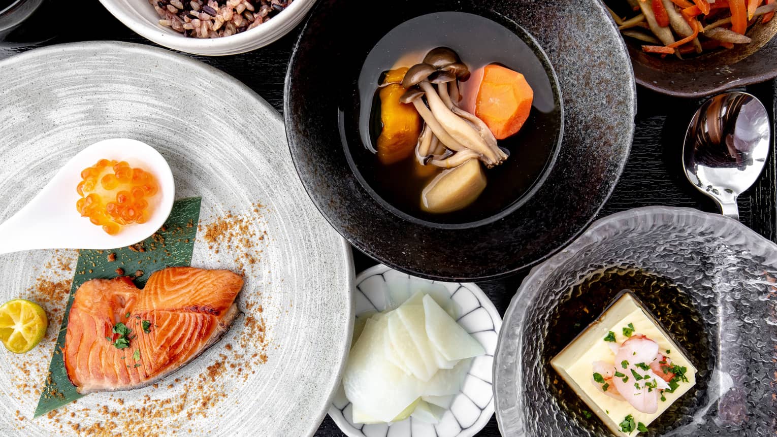 Aerial view of traditional Nourish spread, including salmon, sweet potato and mushroom soup