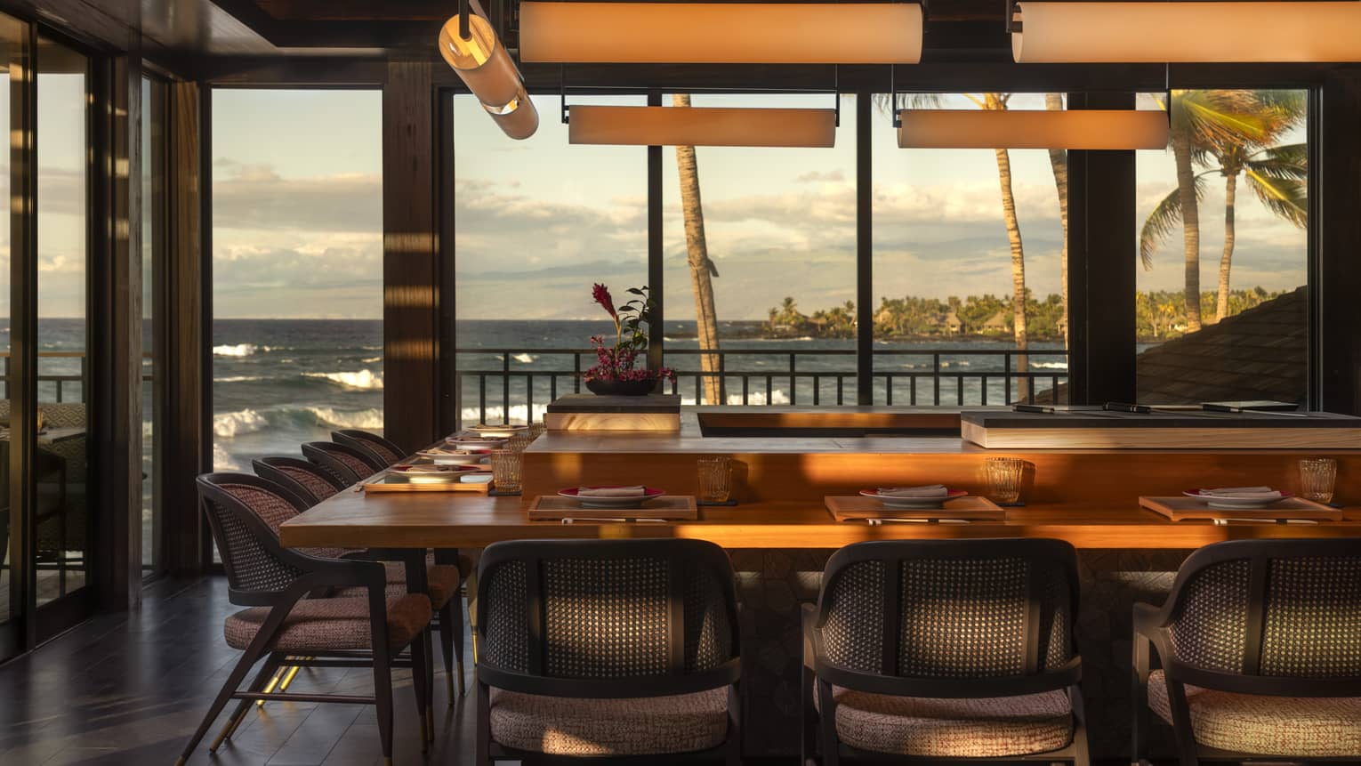 U-shaped sushi bar at tropical luxury resort with ocean view
