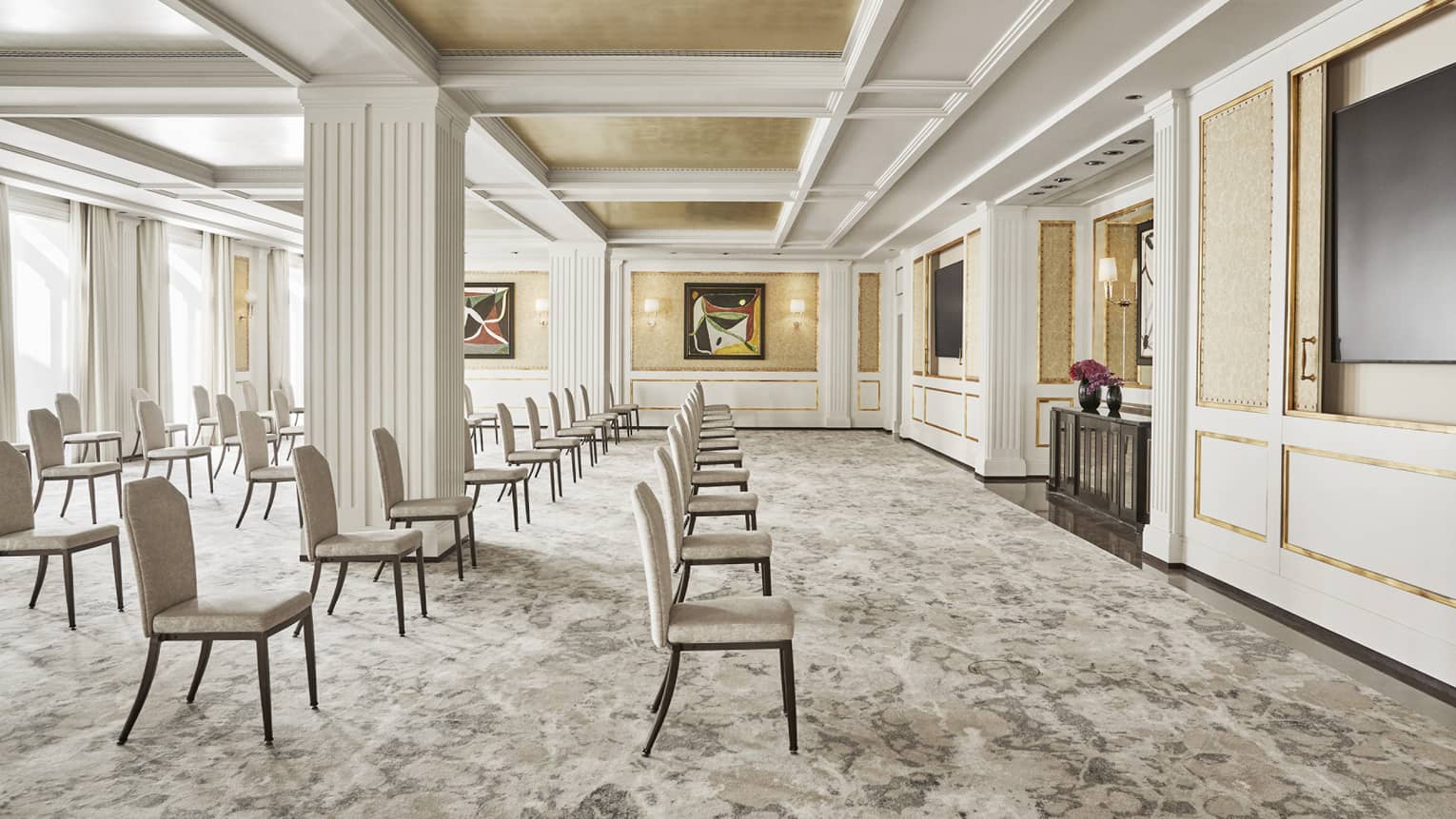 Meeting room with theatre set up, carpeting, white crown molding, white pillar in room